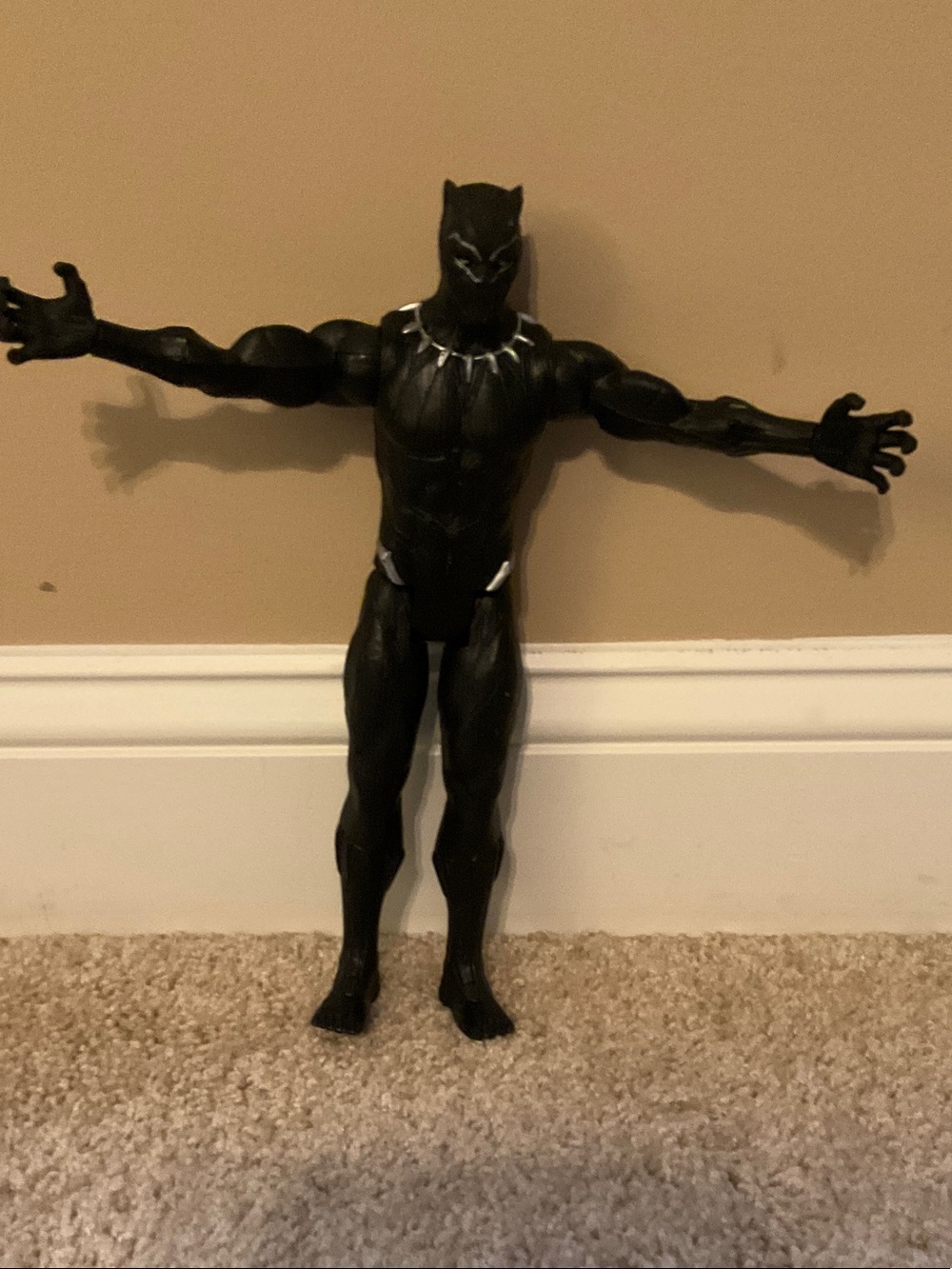 Toy Figure Against Wall